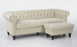 divano accessoriato con pouf