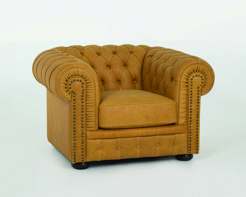 Poltrona Chesterfield con lavorazione in capitonnè