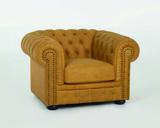 Poltrona Chesterfield con lavorazione in capitonnè
